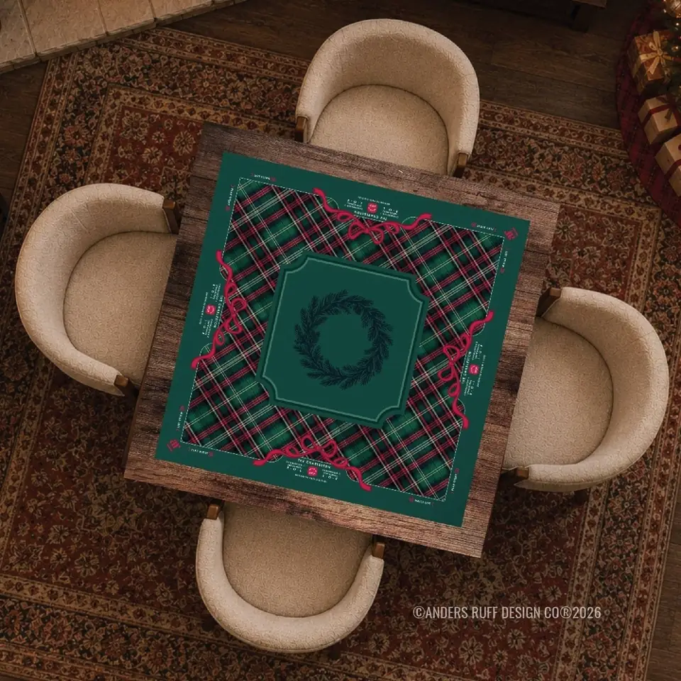 The Evergreen and Tartan mahjong mat on a card table